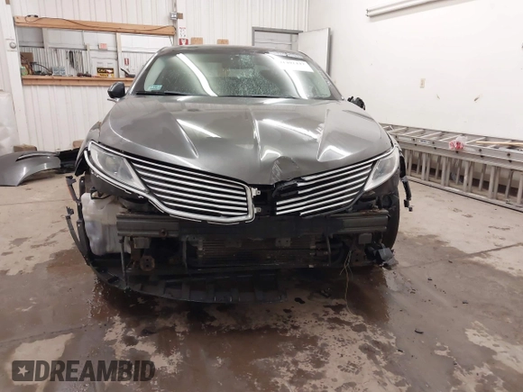 2015 Lincoln MKZ Hybrid with VIN 3LN6L2LU0FR624283, listed as a IAAI auction lot 41402447 with 79,883 mi miles and . Bid and sale history available at DreamBid. Image 13.