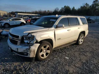 2015 Chevrolet Tahoe LT with VIN 1GNSCBKC8FR512829, listed as a Copart auction lot 86914234 with 246,396 mi miles and Salvage Title. Bid and sale history available at carsss.com. Image 1.