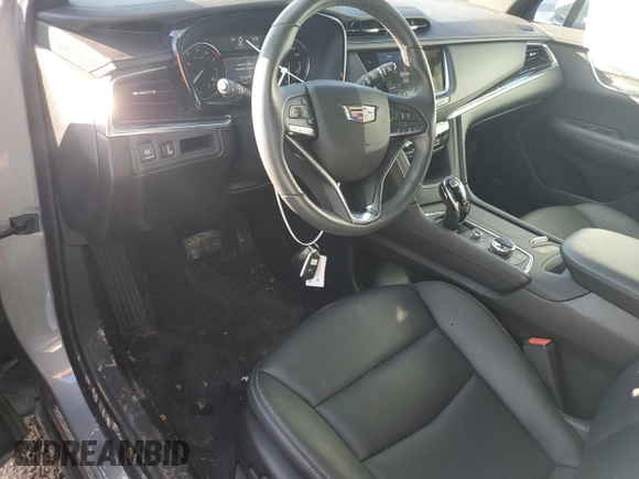 2023 Cadillac XT6 FWD Luxury z VIN 1GYKPAR48PZ115719, wystawiony jako Copart lot #87848435 z przebiegiem 17 597 mil mil oraz Szkoda całkowita • Salvage title. Historia ofert i sprzedaży dostępna na DreamBid. Obrazek 8.