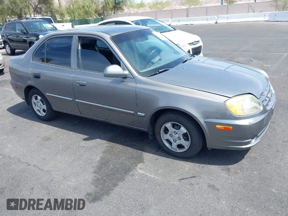 2003 Hyundai Accent GL with VIN KMHCG45C73U471607, listed as a IAAI auction lot 41956551 with 222,305 mi miles. Bid and sale history available at carsss.com. Image 1.