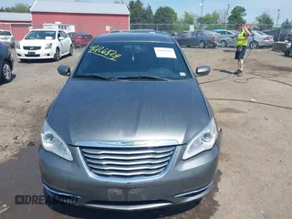 2012 Chrysler 200 Touring with VIN 1C3CCBBGXCN326023, listed as a IAAI auction lot 42126529 with 163,325 mi miles and . Bid and sale history available at carsss.com. Image 12.