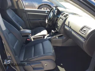 2009 Volkswagen Jetta SE with VIN 3VWRZ71K19M122492, listed as a IAAI auction lot 42270119 with 107,040 mi miles and . Bid and sale history available at DreamBid. Image 5.