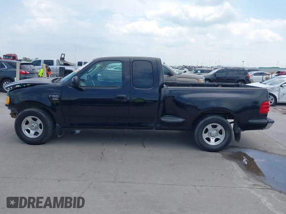 2002 Ford F-150 XL z VIN 1FTRX07W12KD47521, wystawiony jako IAAI lot #42044623 z przebiegiem 334 930 mil mil oraz . Historia ofert i sprzedaży dostępna na DreamBid. Obrazek 15.