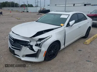2019 Cadillac CTS RWD with VIN 1G6AP5SX0K0121219, listed as a IAAI auction lot 41239899 with 84,588 mi miles and . Bid and sale history available at DreamBid. Image 2.