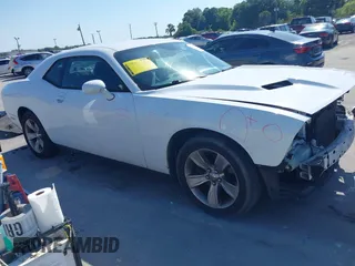 2015 Dodge Challenger SXT with VIN 2C3CDZAG4FH739754, listed as a IAAI auction lot 42028773 with 150,001 mi miles. Bid and sale history available at carsss.com. Image 1.
