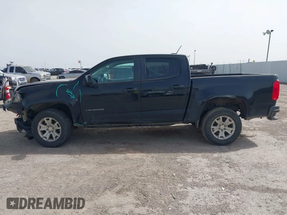 2021 Chevrolet Colorado 2WD LT with VIN 1GCGSCEN4M1141667, listed as a IAAI auction lot 41712760 with 105,905 mi miles. Bid and sale history available at carsss.com. Image 14.