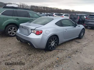 2015 Subaru BRZ Premium with VIN JF1ZCAB15F9600002, listed as a IAAI auction lot 41226855 with 163,773 mi miles and . Bid and sale history available at DreamBid. Image 4.