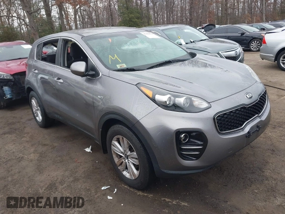 2018 Kia Sportage LX with VIN KNDPMCAC7J7393243, listed as a IAAI auction lot 41484579 with 122,022 mi miles. Bid and sale history available at carsss.com. Image 1.