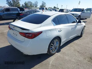 2019 Infiniti Q50 3.0t LUXE with VIN JN1EV7AP2KM543392, listed as a IAAI auction lot 41068209 with 55,897 mi miles. Bid and sale history available at carsss.com. Image 4.