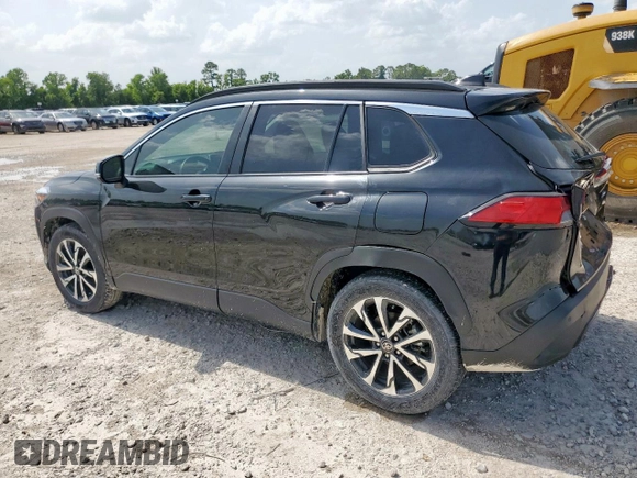 2023 Toyota Corolla Cross XLE with VIN 7MUDAAAG2PV072301, listed as a Copart auction lot 63484815 with 25,017 mi miles and Salvage title. Bid and sale history available at DreamBid. Image 2.