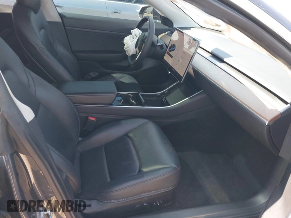 2020 Tesla Model 3 Standard Range Plus with VIN 5YJ3E1EA5LF644282, listed as a IAAI auction lot 41710124 with 69,969 mi miles and . Bid and sale history available at DreamBid. Image 5.