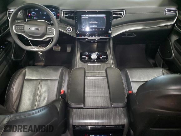 2023 Jeep Wagoneer Series III с VIN 1C4SJVDP0PS572632, выставлен на аукционе Copart как лот 57608885 с пробегом 58 769 миль миль и Чистый • Clean title. История ставок и продаж доступна на DreamBid. Изображение 8.
