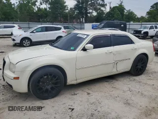 2009 Chrysler 300 Touring with VIN 2C3LA53V79H553658, listed as a Copart auction lot 60723595 with 129,001 mi miles and Salvage title. Bid and sale history available at DreamBid. Image 1.