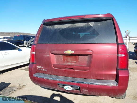 2016 Chevrolet Tahoe LTZ with VIN 1GNSKCKC9GR205745, listed as a IAAI auction lot 41710241 with 94,931 mi miles. Bid and sale history available at carsss.com. Image 16.