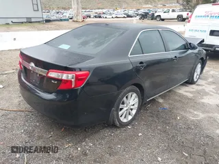 2014 Toyota Camry SE with VIN 4T1BK1FK8EU539138, listed as a IAAI auction lot 41802302 with 91,205 mi miles. Bid and sale history available at carsss.com. Image 4.