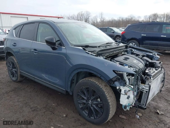 2022 Mazda CX-5 2.5 S Carbon Edition with VIN JM3KFBCM2N0529241, listed as a IAAI auction lot 41708100 with NaN miles. Bid and sale history available at carsss.com. Image 1.