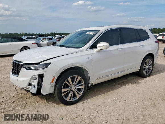 2020 Cadillac XT6 FWD Premium Luxury z VIN 1GYKPCRS9LZ107178, wystawiony jako Copart lot #58789335 z przebiegiem 154 428 mil mil oraz Nie do naprawy. Historia ofert i sprzedaży dostępna na DreamBid. Obrazek 1.