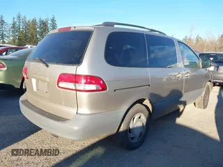 2001 Toyota Sienna LE with VIN 4T3ZF13C21U402424, listed as a IAAI auction lot 41707228 with 259,327 mi miles. Bid and sale history available at carsss.com. Image 4.