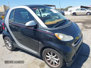 2008 Smart fortwo Pure with VIN WMEEJ31X78K180398, listed as a IAAI auction lot 42193886 with 98,136 mi miles and . Bid and sale history available at DreamBid. Image 1.