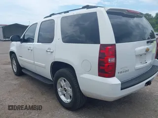 2007 Chevrolet Tahoe LTZ with VIN 1GNFC13J47J336516, listed as a IAAI auction lot 42545424 with 211,669 mi miles and . Bid and sale history available at DreamBid. Image 3.
