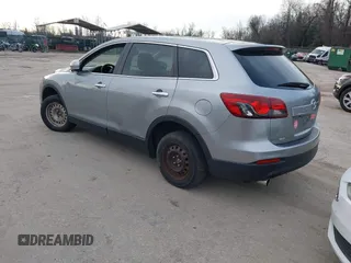 2013 Mazda CX-9 Grand Touring z VIN JM3TB3DV1D0401102, wystawiony jako IAAI lot #41248346 z przebiegiem 122 555 mil mil oraz . Historia ofert i sprzedaży dostępna na DreamBid. Obrazek 3.