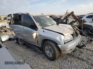 2004 Suzuki Grand Vitara LX z VIN JS3TD62V744104983, wystawiony jako Copart lot #65290274 z przebiegiem Nie podano mil oraz Szkoda całkowita • Salvage title. Historia ofert i sprzedaży dostępna na DreamBid. Obrazek 4.