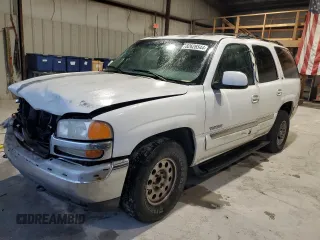 2000 GMC Yukon SLT with VIN 1GKEC13T9YJ159294, listed as a Copart auction lot 82626544 with 0 mi miles and Salvage Title. Bid and sale history available at carsss.com. Image 1.