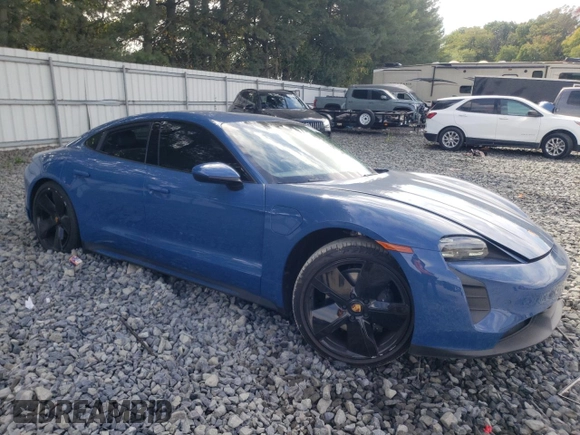 2023 Porsche Taycan with VIN WP0AA2Y1XPSA14080, listed as a Copart auction lot 72990774 with 18,311 mi miles and Salvage Title. Bid and sale history available at DreamBid. Image 4.