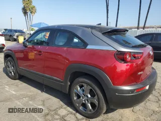 2022 Mazda MX-30 Premium Plus Package with VIN JM1DRADB7N0100256, listed as a Copart auction lot 69304084 with 11,057 mi miles and Salvage Title. Bid and sale history available at carsss.com. Image 2.