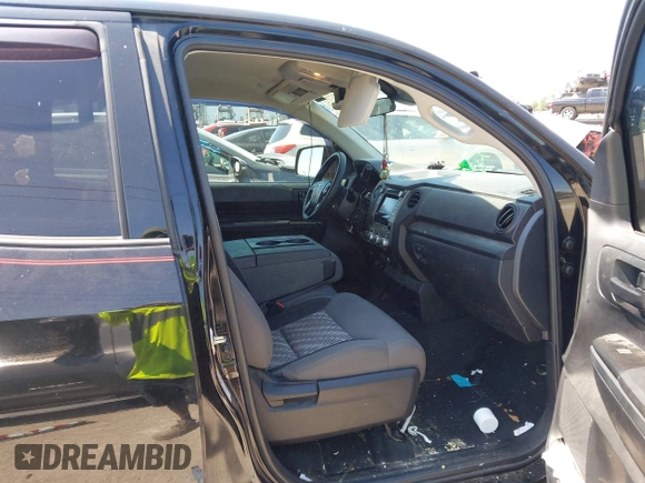 2019 Toyota Tundra SR with VIN 5TFUY5F13KX852912, listed as a IAAI auction lot 42327399 with 124,193 mi miles and . Bid and sale history available at DreamBid. Image 5.