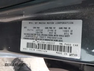 2014 Mazda 3 S Touring with VIN JM1BM1L30E1200337, listed as a IAAI auction lot 41906333 with 92,873 mi miles and . Bid and sale history available at DreamBid. Image 9.