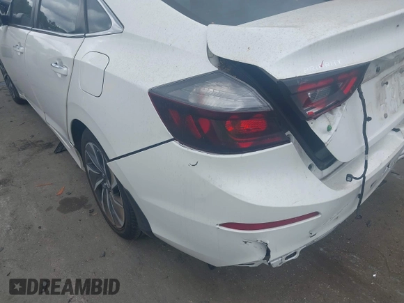 2019 Honda Insight Touring with VIN 19XZE4F91KE007748, listed as a IAAI auction lot 40233174 with 78,036 mi miles and . Bid and sale history available at DreamBid. Image 17.