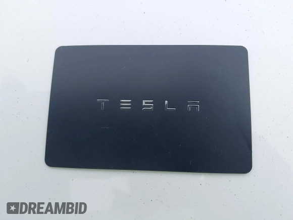 2018 Tesla Model 3 Long Range Battery z VIN 5YJ3E1EBXJF092025, wystawiony jako IAAI lot #42268369 z przebiegiem 132 687 mil mil oraz . Historia ofert i sprzedaży dostępna na DreamBid. Obrazek 11.