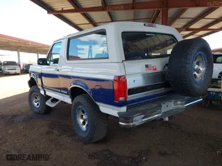 1996 Ford Bronco Custom with VIN 1FMEU15H3TLB30609, listed as a IAAI auction lot 42053896 with 238,597 mi miles. Bid and sale history available at carsss.com. Image 3.