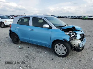 2014 Scion xD with VIN JTKKUPB41E1044556, listed as a Copart auction lot 57123795 with Not provided miles and Salvage title. Bid and sale history available at DreamBid. Image 4.