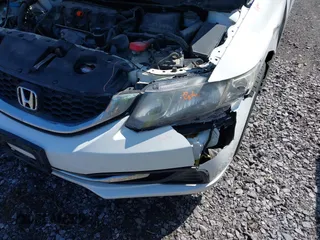2015 Honda Civic LX with VIN 19XFB2F53FE281911, listed as a IAAI auction lot 42157020 with 201,003 mi miles and . Bid and sale history available at DreamBid. Image 6.