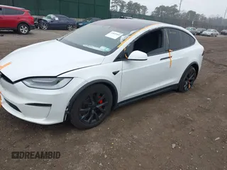 2022 Tesla Model X Plaid z VIN 7SAXCBE67NF339557, wystawiony jako IAAI lot #41825360 z przebiegiem 70 mil mil oraz . Historia ofert i sprzedaży dostępna na DreamBid. Obrazek 21.