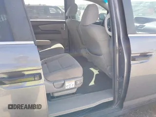2015 Honda Odyssey LX with VIN 5FNRL5H29FB032327, listed as a IAAI auction lot 42052043 with 153,365 mi miles and . Bid and sale history available at DreamBid. Image 8.