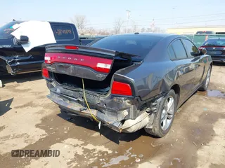 2014 Dodge Charger SXT Plus with VIN 2C3CDXJG0EH104680, listed as a IAAI auction lot 41784303 with 135,771 mi miles. Bid and sale history available at carsss.com. Image 6.