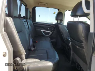 2017 Nissan Titan Pro-4X z VIN 1N6BA1F40HN559615, wystawiony jako Copart lot #57636455 z przebiegiem 99 803 mil mil oraz Szkoda całkowita • Salvage title. Historia ofert i sprzedaży dostępna na DreamBid. Obrazek 10.