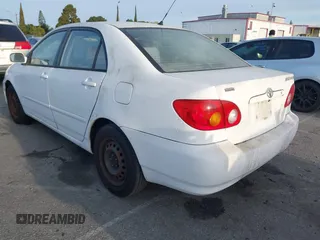 2004 Toyota Corolla CE with VIN JTDBR32E042025208, listed as a IAAI auction lot 41934485 with 299,999 mi miles. Bid and sale history available at carsss.com. Image 3.