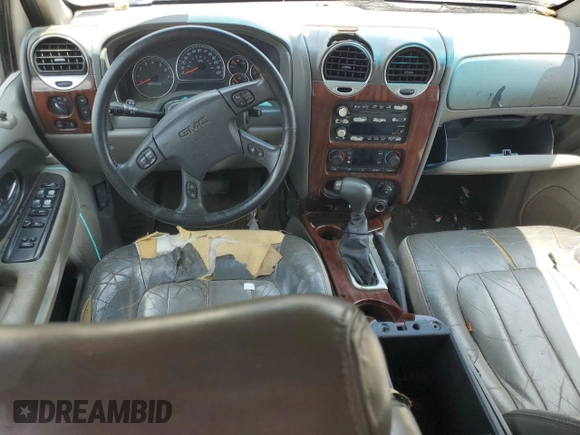 2002 GMC Envoy SLT z VIN 1GKDS13S922263923, wystawiony jako Copart lot #59234395 z przebiegiem Nie podano mil oraz Szkoda całkowita • Salvage title. Historia ofert i sprzedaży dostępna na DreamBid. Obrazek 8.