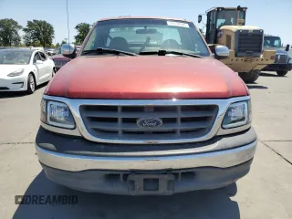 2000 Ford F-150 XL with VIN 2FTZF172XYCA85601, listed as a Copart auction lot 59134645 with Not provided miles and Salvage title. Bid and sale history available at DreamBid. Image 5.