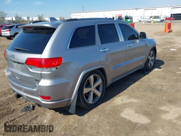 2014 Jeep Grand Cherokee Overland with VIN 1C4RJFCT9EC231840, listed as a IAAI auction lot 42114284 with 170,691 mi miles and . Bid and sale history available at DreamBid. Image 4.