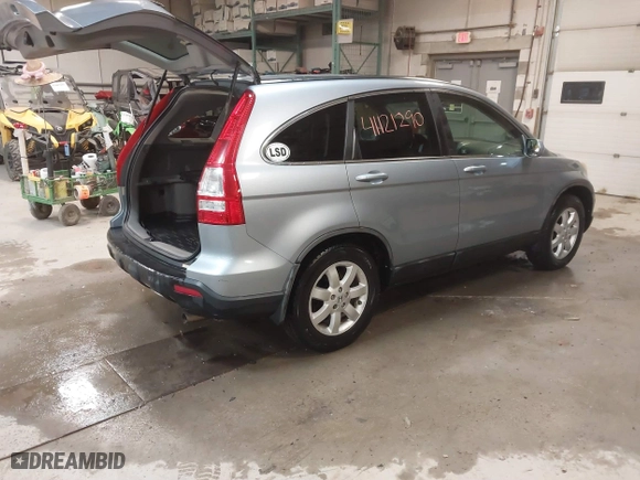 2009 Honda CR-V EX-L with VIN 5J6RE48739L037292, listed as a IAAI auction lot 41121290 with 150,597 mi miles. Bid and sale history available at carsss.com. Image 4.