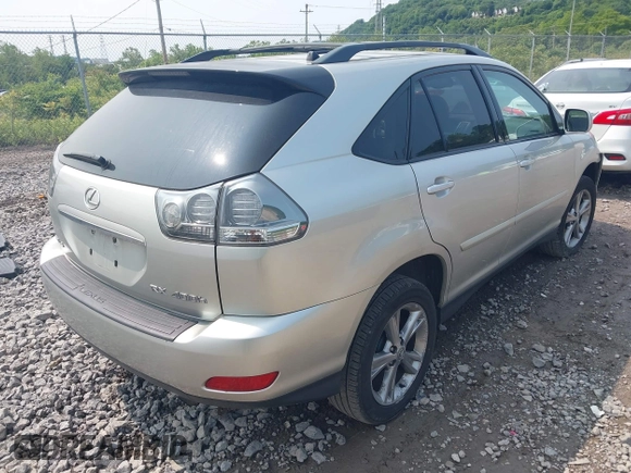 2006 Lexus RX 400h with VIN JTJHW31U460032959, listed as a IAAI auction lot 42382651 with 136,961 mi miles and . Bid and sale history available at DreamBid. Image 4.
