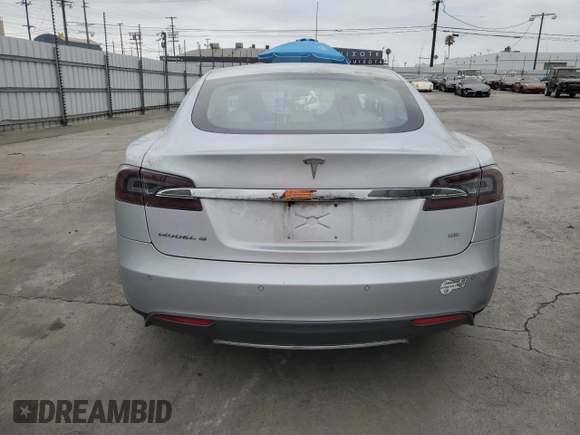 2014 Tesla Model S 60 with VIN 5YJSA1H14EFP34335, listed as a Copart auction lot 65504325 with Not provided miles and Clean title. Bid and sale history available at DreamBid. Image 6.