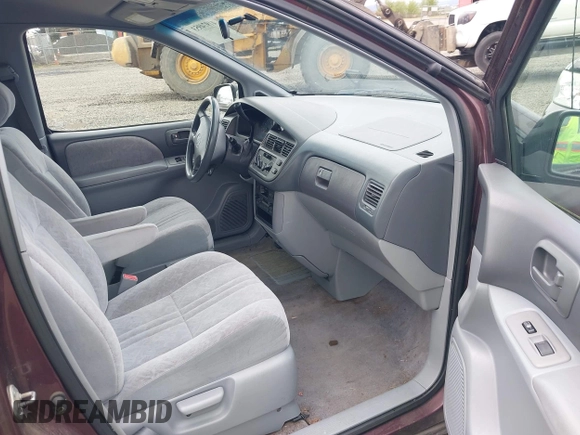 1999 Toyota Sienna LE with VIN 4T3ZF13C7XU152879, listed as a IAAI auction lot 41974953 with 201,644 mi miles. Bid and sale history available at carsss.com. Image 5.