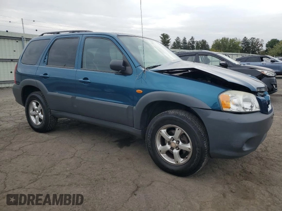 2005 Mazda Tribute i with VIN 4F2YZ02ZX5KM17738, listed as a Copart auction lot 72346384 with 203,245 mi miles and Salvage Title. Bid and sale history available at carsss.com. Image 4.