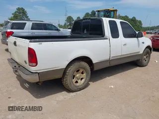 2002 Ford F-150 XL with VIN 1FTRX172X2NB30342, listed as a IAAI auction lot 42015209 with 1 mi miles. Bid and sale history available at carsss.com. Image 4.